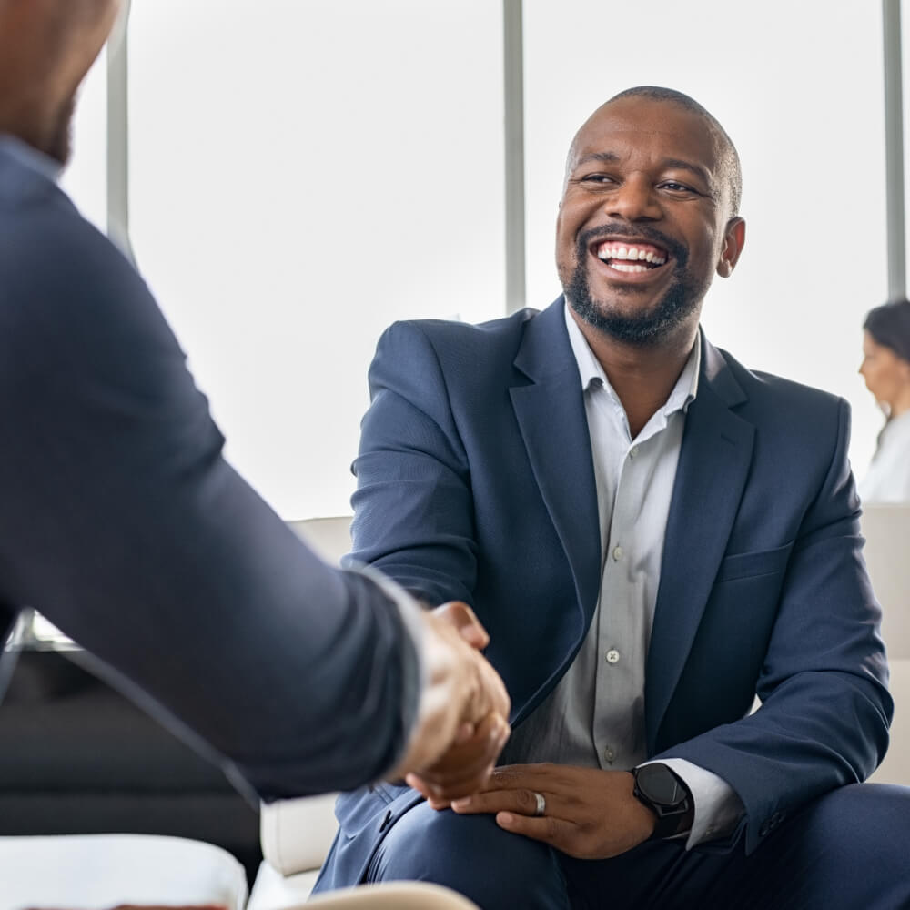 two men shaking hands 